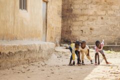 full-shot-african-boys-playing-together-scaled